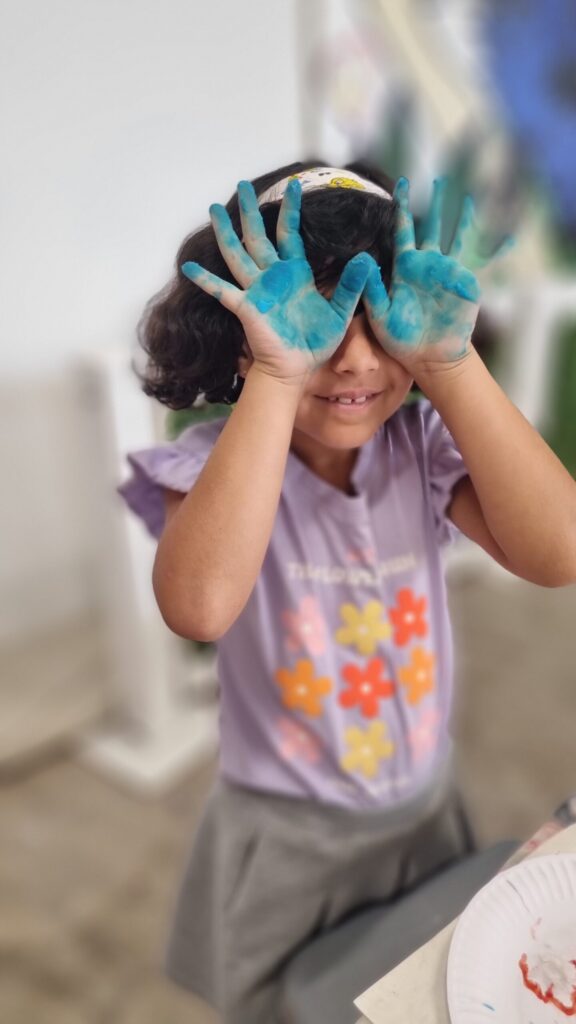 picture of a girl with messy hands