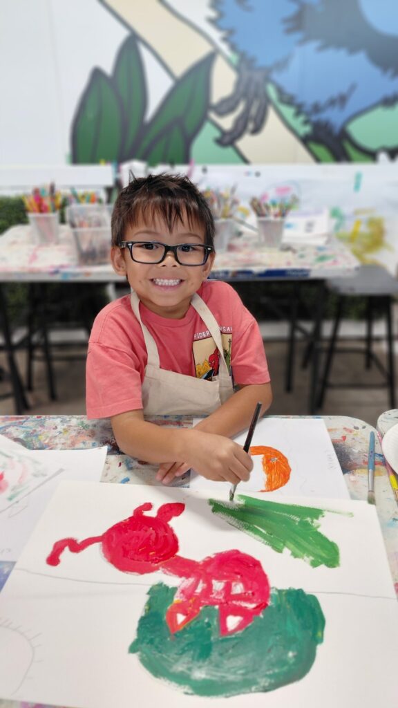 six year old boy painting